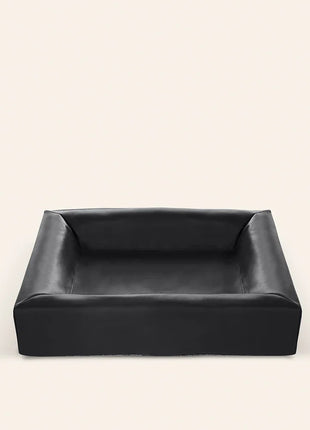 Cama para cão Bia Bed, modelo de cesto ortopédico preto.