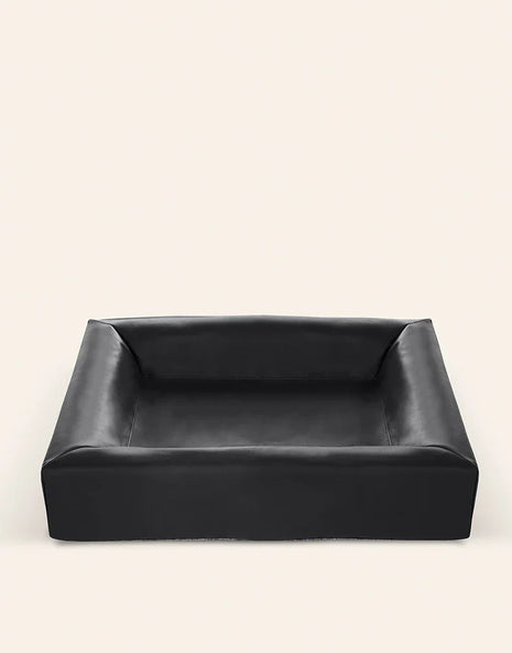 Cama para cão Bia Bed, modelo de cesto ortopédico preto.